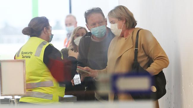 Arrivals to Hobart screened at Hobart Airport after Tasmania closed it's border with Victoria. Picture: Nikki Davis-Jones