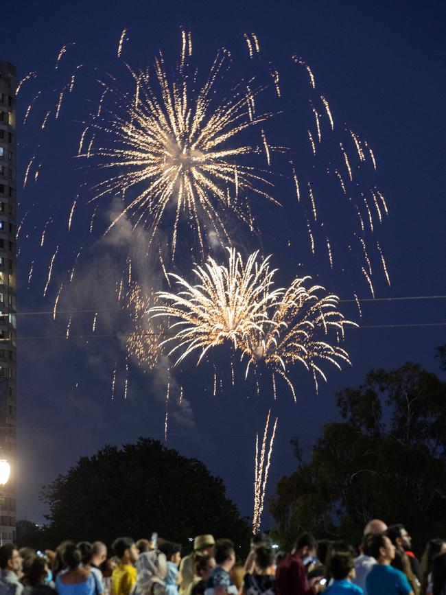 People watch the 9.30pm fireworks from Princes Bridge, Melbourne. Picture: Mark Stewart