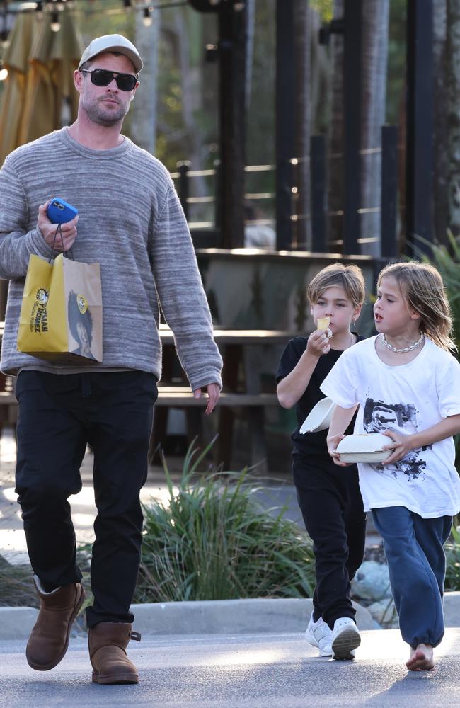 The star strolled through Byron Bay with his twin boys in tow. Picture: Matrix