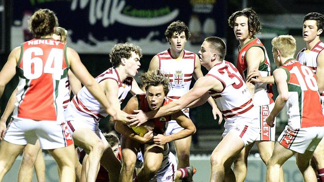 Henley High’s Lachie McNeil with the ball during last year’s State knockout grand final against Prince Alfred College. Picture: Bianca De Marchi