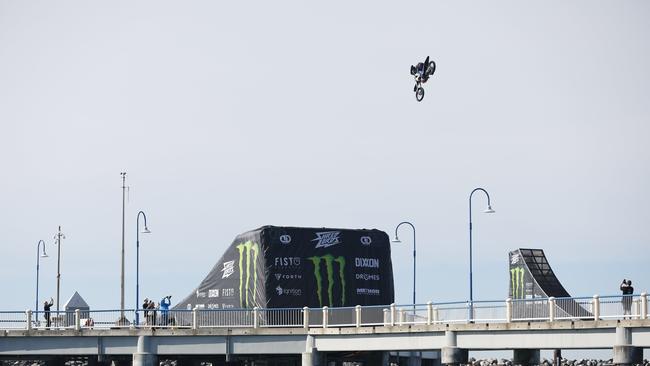 Harry Bink during his double backflip attempt at the Redcliffe Jetty. Picture: Josh Woning