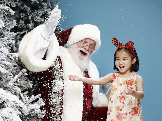 DAILY TELEGRAPH 15TH SEPTEMBER 2024Pictured at News Corp in Sydney is Santa with excited Christmas fan Ellie Cheng.Today is 100 days till Christmas 2024.Picture: Richard Dobson