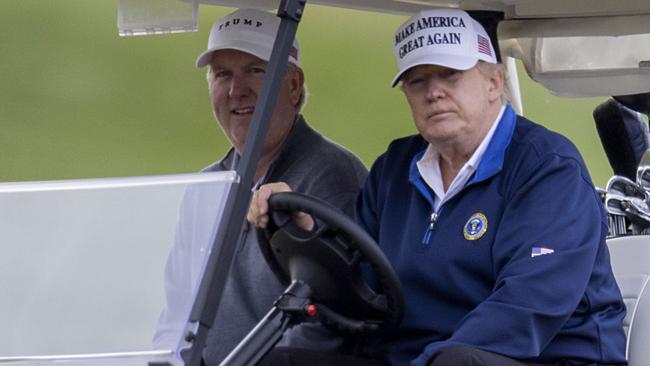 ‘It’s time for them to stop the nonsense’: Donald Trump between holes at his golf club in Sterling, Virginia, on Monday. Picture: AFP