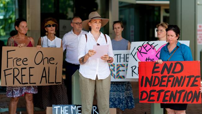 Kat Mcnanara and supporters attempt to deliver a letter to the Department of Home Affairs in their Darwin office. Photograph: Che Chorley