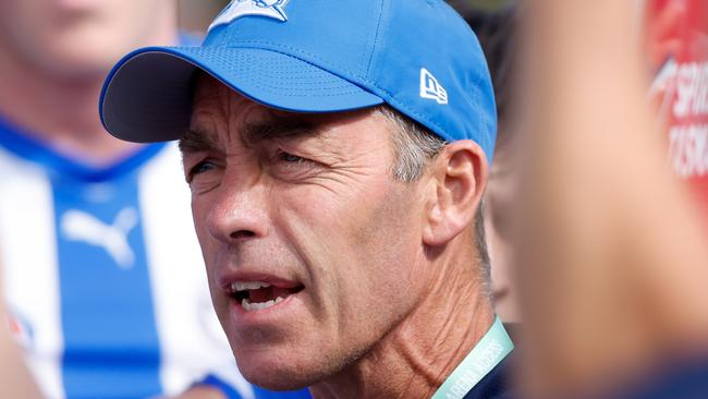 MELBOURNE, AUSTRALIA - MARCH 03: Alastair Clarkson, Senior Coach of the Kangaroos addresses his players during the 2024 AFL AAMI Community Series match between the St Kilda Saints and North Melbourne Kangaroos at RSEA Park on March 03, 2024 in Melbourne, Australia. (Photo by Dylan Burns/AFL Photos via Getty Images)