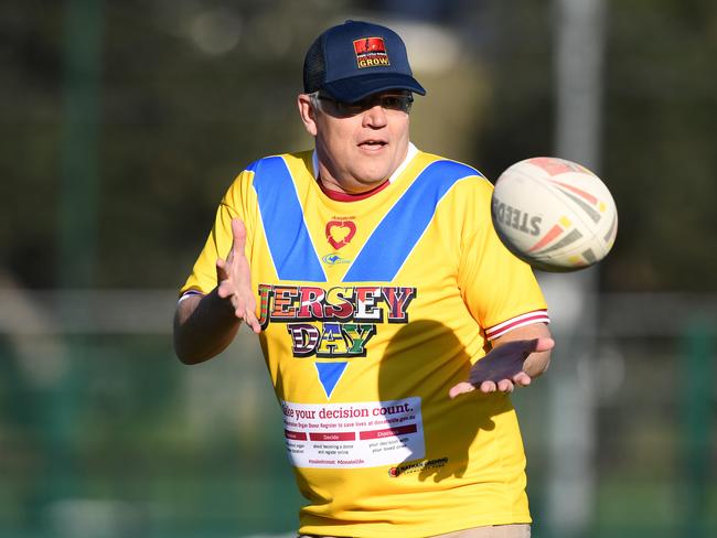 Prime Minister Scott Morrison joins a rugby league drill with students from the Clontarf Academy at Endeavour Sports High School in Sydney. Picture: AAP Image/Joel Carrett