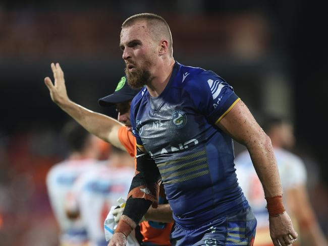 DARWIN, AUSTRALIA - APRIL 19:  Clint Gutherson of the Eels is attended to by a trainer after an injury during the round seven NRL match between Parramatta Eels and Dolphins at TIO Stadium on April 19, 2024, in Darwin, Australia. (Photo by Mark Metcalfe/Getty Images)