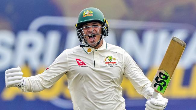 Usman Khawaja celebrates his own outstanding ton. (Photo by Ishara S. KODIKARA / AFP)