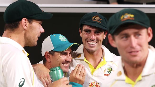 Australian coach Justin Langer and captain Pat Cummins celebrate victory against England. (Photo by Mark Kolbe – CA/Cricket Australia via Getty Images)