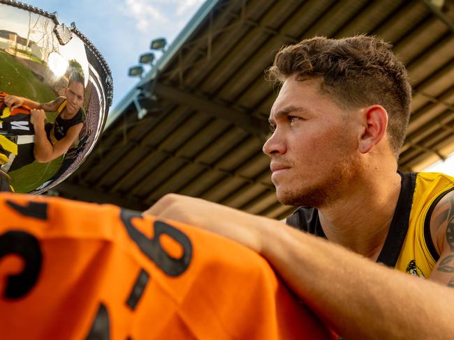 Nightcliff captain Phillip Wills with the NTFL Premiership Cup Picture: Che Chorley