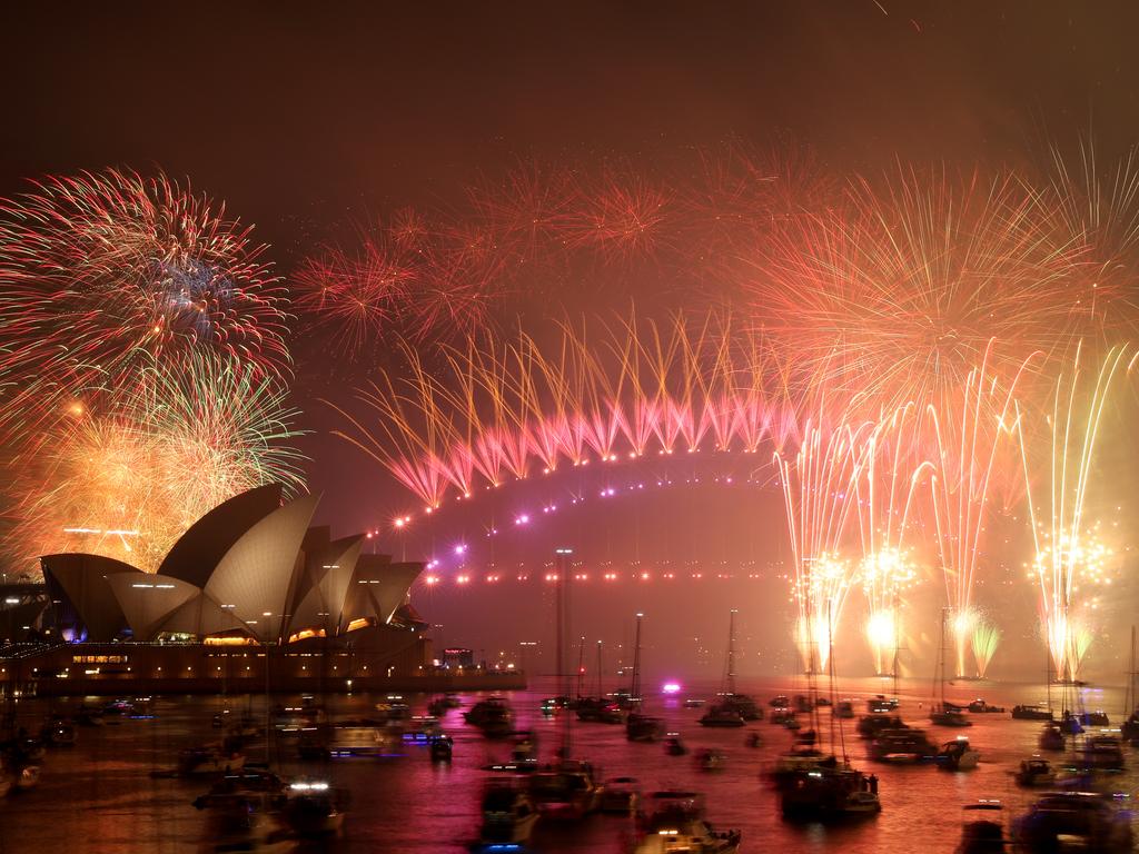 New Year's Eve midnight fireworks over Sydney Harbour as seen from Mrs Macquarie's Chair. Picture: Jonathan Ng