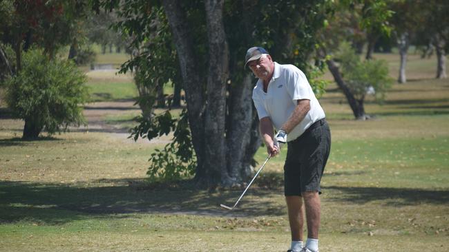 John Roser chips onto the green at Proserpine Golf Club.