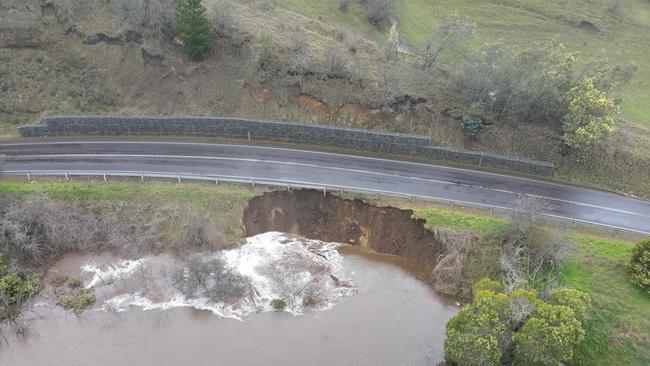 The Lyell Highway at Plenty has been reopened to one lane with traffic signals and workers on site while RoadsTas works on a plan to repair the road. Picture: RoadsTas