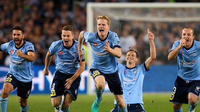 Sydney FC celebrate their grand final victory as Milos Ninkovic slots home during the shootout.. (Photo by Jason McCawley/Getty Images)