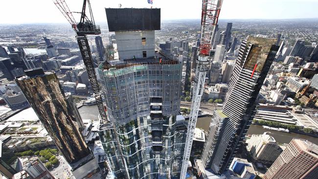 Australia 108 as seen from a crane at the top of the behemoth construction now taller than Eureka Tower, right. Picture: David Caird