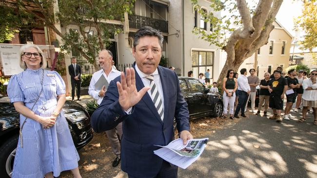 Auctioneer Scott Kennedy Green called bids on the Paddington home.