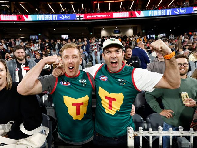 Tasmania Devils fans Bradley Cox-Goodyear and Will Tatchell at the MCG in Round 2, days before the state went to the polls. The stadium which would house the Devils was a major election issue. Picture: Michael Willson/AFL Photos via Getty Images.