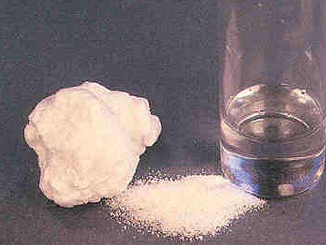 Sample of fantasy GHB (Gamma Hydroxy Butyrate) narcotic drug in rock, powder and liquid form.