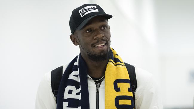 Usain Bolt at Sydney Airport on Saturday ahead of starting his trial period with Central Coast Mariners.