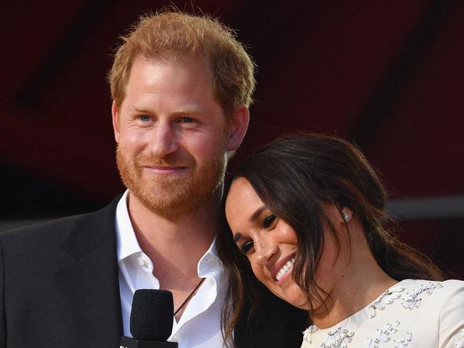 (FILES) Britain's Prince Harry and Meghan Markle speak during the 2021 Global Citizen Live festival at the Great Lawn, Central Park on September 25, 2021 in New York City. A multi-million-dollar deal between a media group run by Britain's Prince Harry and his wife Meghan Markle, and streaming giant Spotify is to end, a report said June 15, 2023. (Photo by Angela Weiss / AFP)