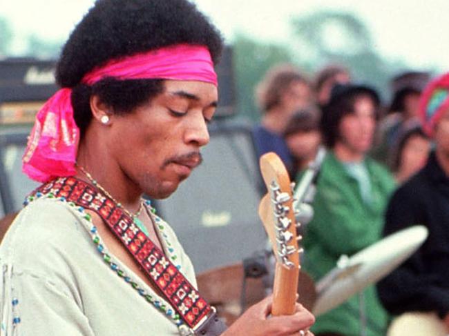 AUS50TH 1969: This handout photo by Henry Diltz shows musician Jimi Hendrix at the original Woodstock festival in Bethel, New York in August 1969. The music festival took place from August 15-18. AFP PHOTO/HENRY DILTZ/MORRISON HOTEL GALLERY/NEWSCOM/HO   RESTRICTED TO EDITORIAL USE Picture: Supplied