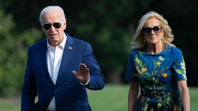 US President Joe Biden and First lady Jill Biden walk to the White House in Washington this week.