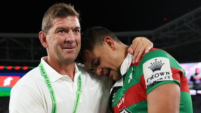 SYDNEY, AUSTRALIA - MARCH 25:  Latrell Mitchell of the Rabbitohs celebrates with Rabbitohs head coach Jason Demetriou after victroy during the round four NRL match between South Sydney Rabbitohs and Manly Sea Eagles at Accor Stadium on March 25, 2023 in Sydney, Australia. (Photo by Mark Metcalfe/Getty Images)