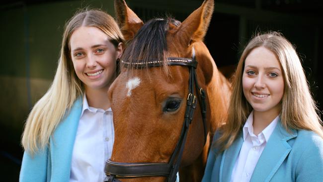 Geelong Grammar boarding students Gen and Lizzie Brand with their horse.