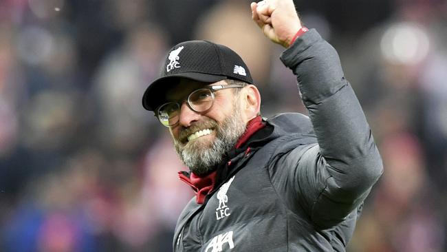 Liverpool's manager Jurgen Klopp celebrates at the end of the group E Champions League soccer match between Salzburg and Liverpool, in Salzburg, Austria, Tuesday, Dec. 10, 2019. Liverpool won 2:0. (AP Photo/Kerstin Joensson)