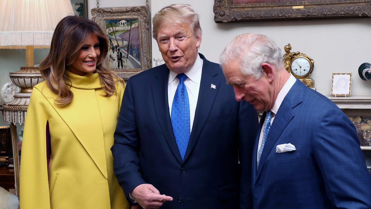 Before going to Buckingham Palace, Melania and Donald Trump joked with Prince Charles at Clarence House. Picture: Chris Jackson/AFP