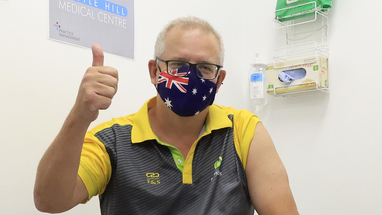 Prime Minister Scott Morrison gives the thumbs up after receiving his COVID-19 vaccination on Sunday. Picture: Mark Evans/Getty Images
