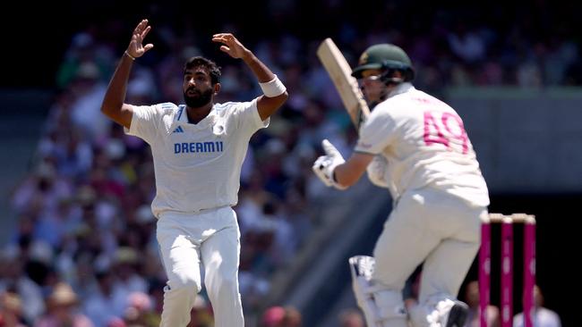 Indian captain Jasprit Bumrah reacts after Australian Steve Smith hit a shot during day two of the fifth cricket Test match. Picture: David Gray