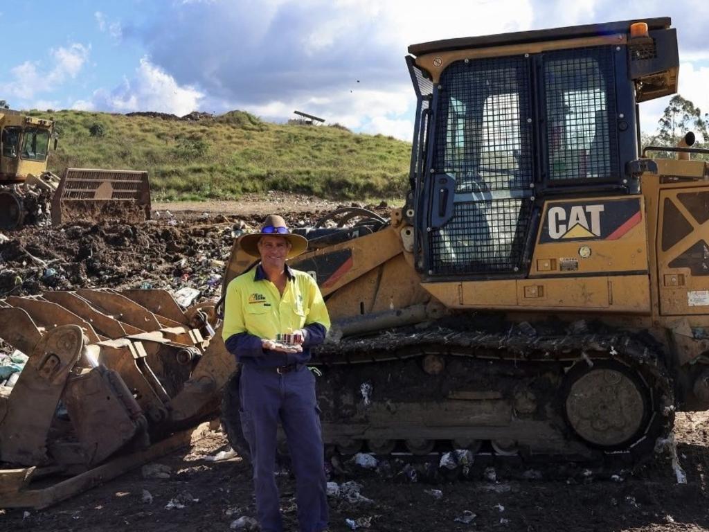 Heavy machine operator Tim found four war medals at Gatton Landfill. Photo: LVRC.