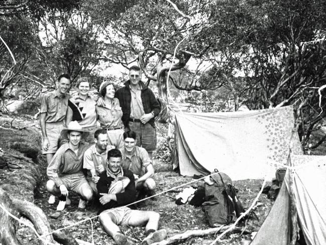 Charles D'Arcy Roberts camping with friends near Charlotte Pass in the Snowy Mountains in 1935. Roberts is second from left in the middle row. Picture: National Library of Australia.