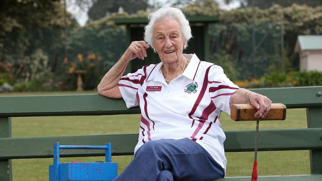 Joy Mead relaxes after a hit at Ivanhoe Croquet Club. Picture: Hamish Blair