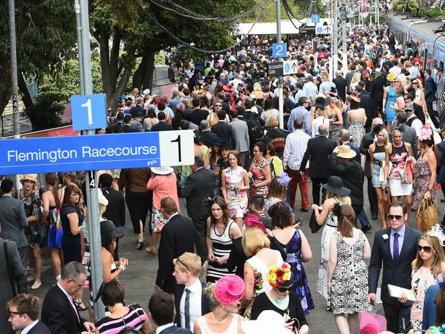 Melbourne Cup. Flemington. Thousands of race goers arrive to Flemington by train. Picture: Jake Nowakowski