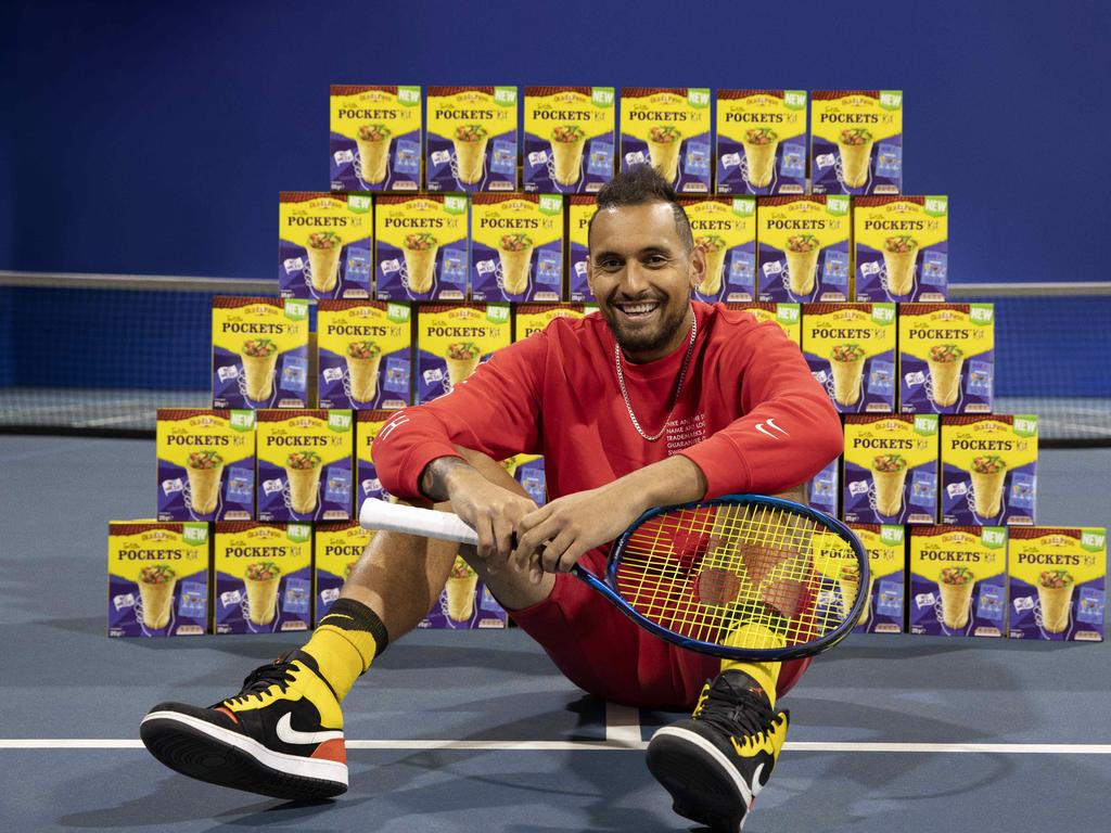 Tennis player Nick Kyrgios serving up meals on the tennis court.