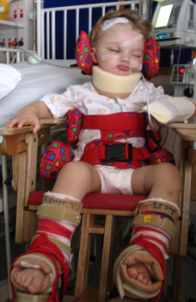 Layton Smith in 2004, then two years old, recovering in hospital after being hit in a car crash now the subject of a court appeal. Picture: Supplied