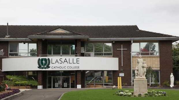 The incident occurred outside La Salle Catholic College in Bankstown just after school finished.
