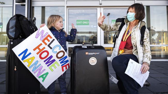 Sophie Mahoney 4 welcomes her nanna Christine Walker to Hobart who arrived from Melbourne. Picture: CHRIS KIDD