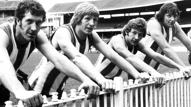 Peter Chisnall, third from left, with North Melbourne teammates Phil Baker, Gary Cowton and Mick Nolan at the MCG in 1974.