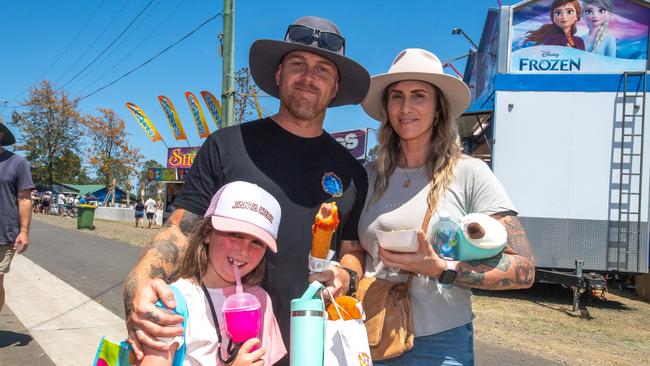 Dave, Shoel and Lakey Surtees enjoying the sun food at the 2023 Lismore Show.