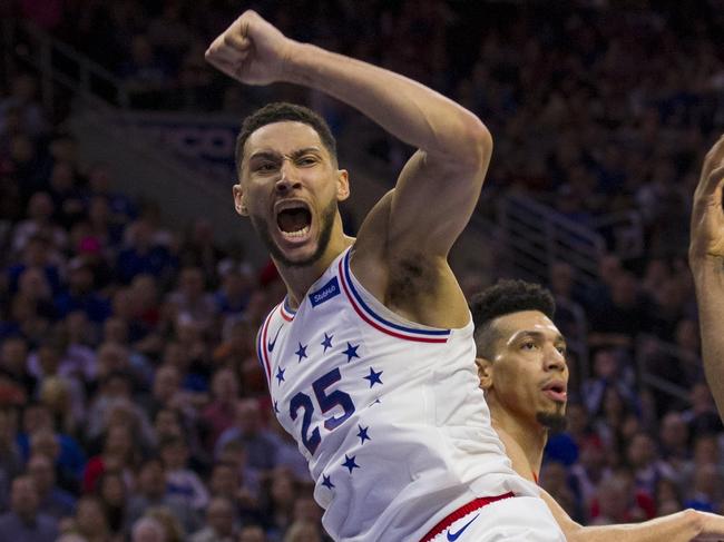 PHILADELPHIA, PA - MAY 09: Ben Simmons #25 of the Philadelphia 76ers reacts in front of Kawhi Leonard #2 of the Toronto Raptors after dunking the ball in the third quarter of Game Six of the Eastern Conference Semifinals at the Wells Fargo Center on May 9, 2019 in Philadelphia, Pennsylvania. The 76ers defeated the Raptors 112-101. NOTE TO USER: User expressly acknowledges and agrees that, by downloading and or using this photograph, User is consenting to the terms and conditions of the Getty Images License Agreement.   Mitchell Leff/Getty Images/AFP == FOR NEWSPAPERS, INTERNET, TELCOS & TELEVISION USE ONLY ==