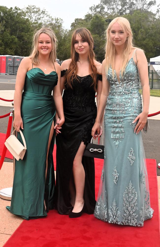 Isha Wallis, Madeline Attard and Tamara Zolotar at Pacific Lutheran College's 2023 formal. Picture: Tegan Annett