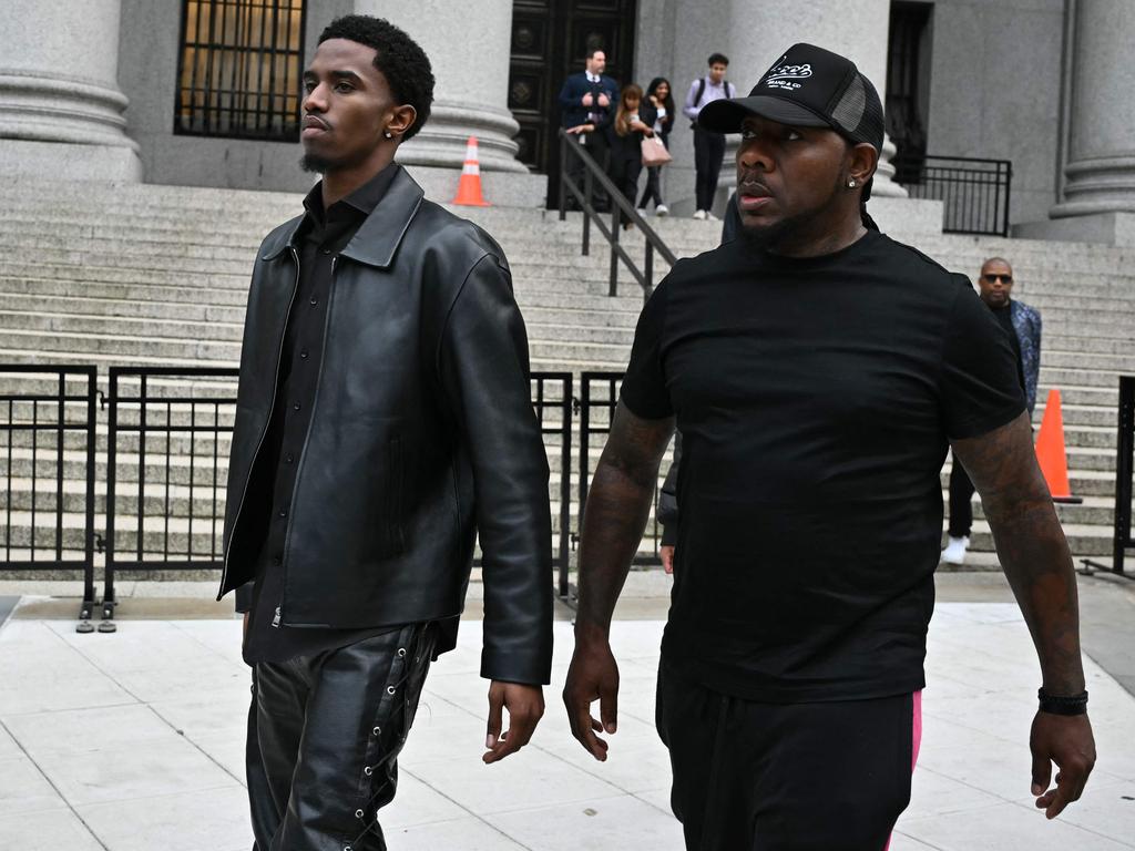 Christian Combs left, son of rapper and music producer Sean "Diddy" Combs, leaves federal court after their father's bail hearing in New York. Picture: AFP.