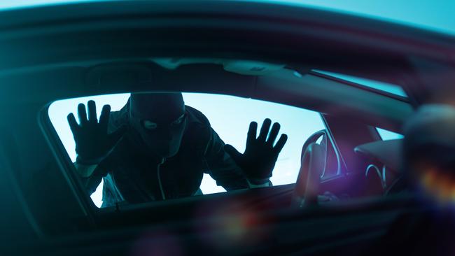 A Springfield Lakes woman has escaped a terrifying armed carjacking.