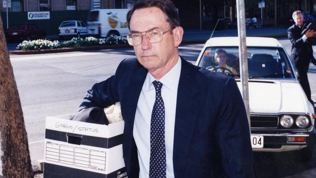 Tim Marcus Clark carrying documents into the Supreme Court in 1996.