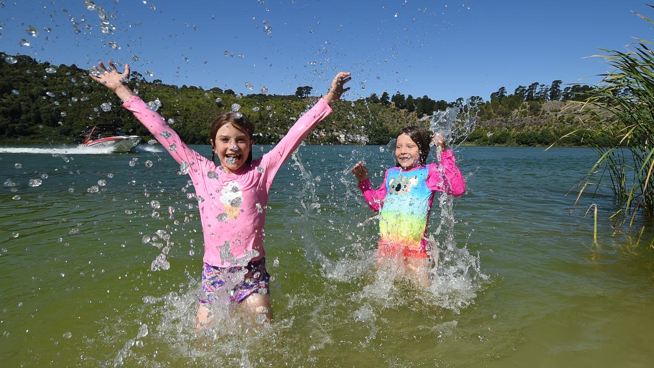 Beating the heat in Mount Gambier were sisters Lani Platt and Aisha from Melbourne in Valley Lake. Picture: Naomi Jellicoe