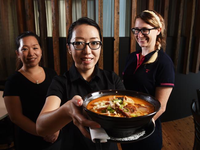 Rendezvous Laksa employees Iras Leung, manager Gloria Leung and sister-in-law Emily Leung.