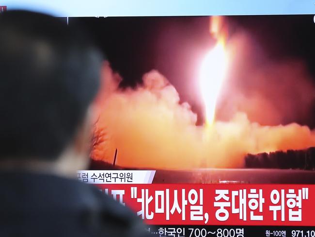 A man watches a TV screen showing a local news program reporting with a file footage of North Korea's missile launch, at the Seoul Railway Station in Seoul, South Korea, Wednesday, Nov. 29, 2017. After 2 Â½ months of relative peace, North Korea launched its most powerful weapon yet early Wednesday, a presumed intercontinental ballistic missile that could put Washington and the entire eastern U.S. seaboard within range. The letters read "North Korea's missile launch, serious threat." (AP Photo/Lee Jin-man)